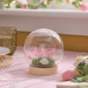 Batteriebetriebene LED-Osterkugel mit Hase & rosa Blumen