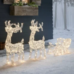 Bicolor Solar-LED-Rentiere mit Schlitten Swinsty