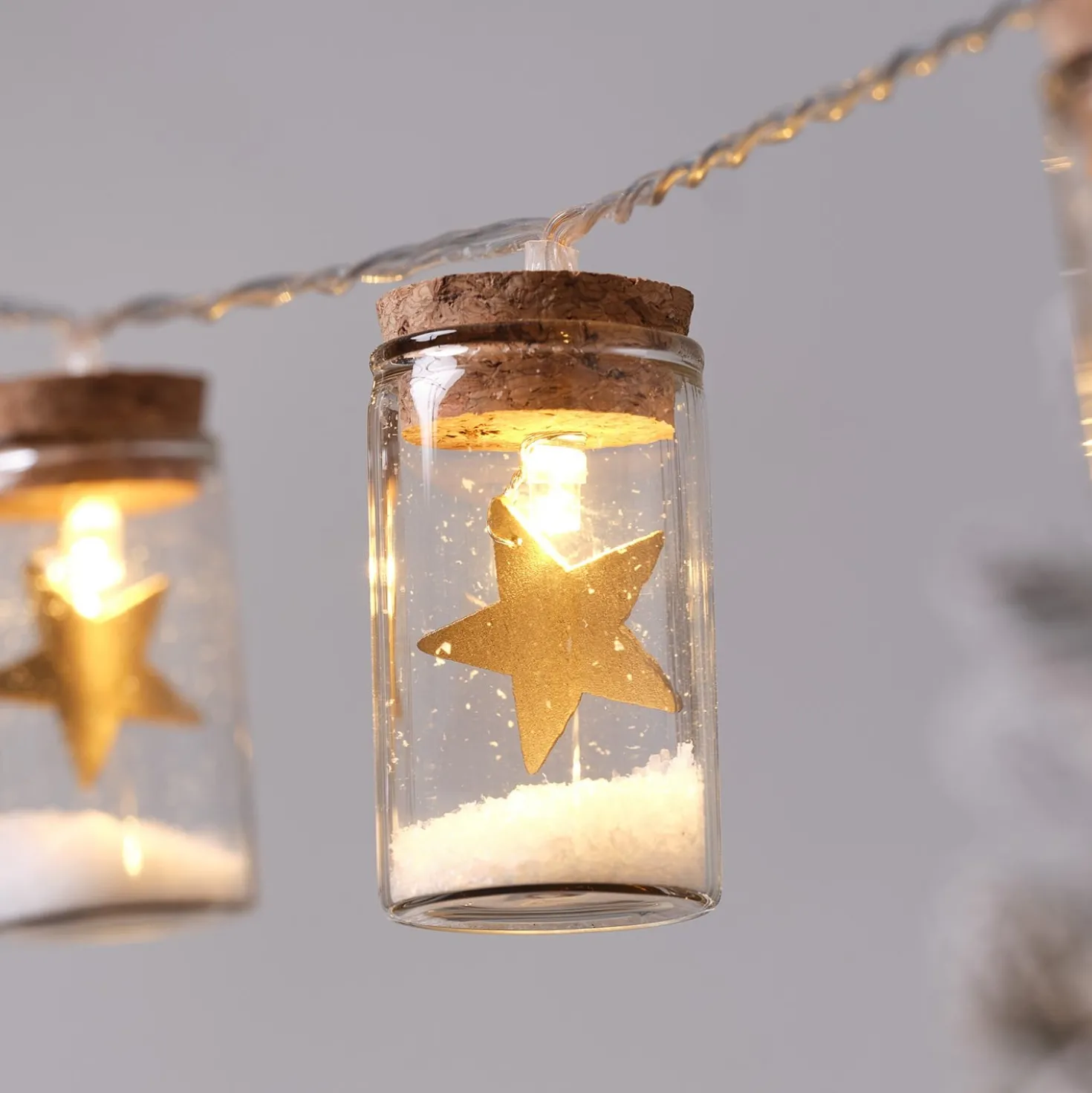 10er LED-Lichterkette Laterne mit Sternen aus Glas in Gold