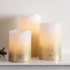 3er Set LED Echtwachs Kerzen warmweiß flackernd gold