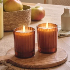 2er Set TruGlow® LED-Kerzen im geriffelten Glas in Orange mit Fernbedienung