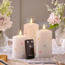 3er Set TruGlow® LED-Kerzen mit Blumen & Fernbedienung