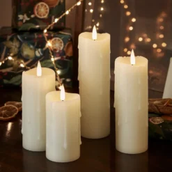 4er Set TruGlow® LED Kerzen schmal mit Wachstropfen mit Fernbedienung