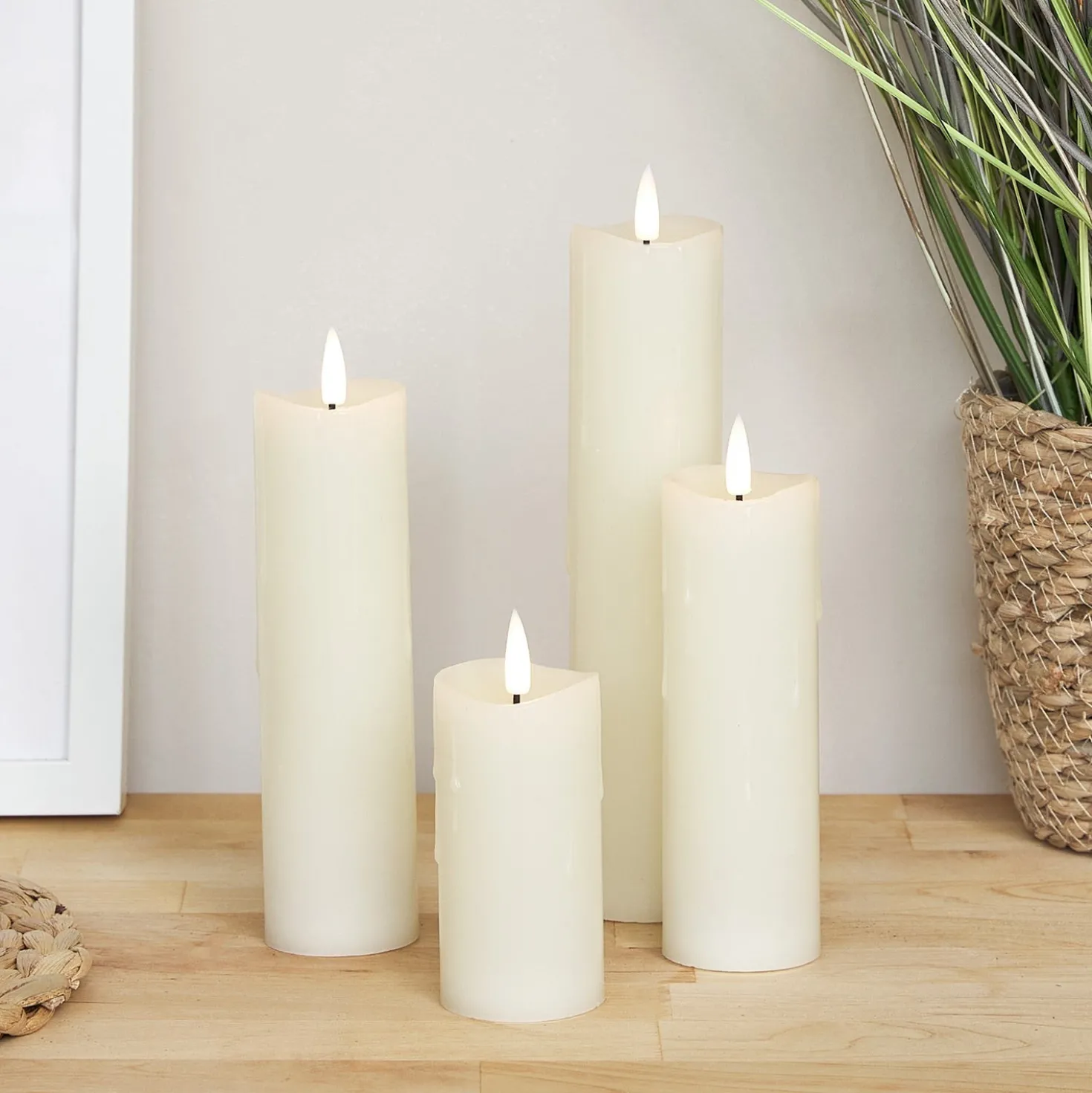 4er Set TruGlow® LED Kerzen schmal mit Wachstropfen mit Fernbedienung