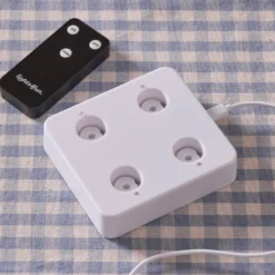 4er Set TruGlow® LED Stabkerzen Echtwachs elfenbeinfarben wiederaufladbar mit Fernbedienung