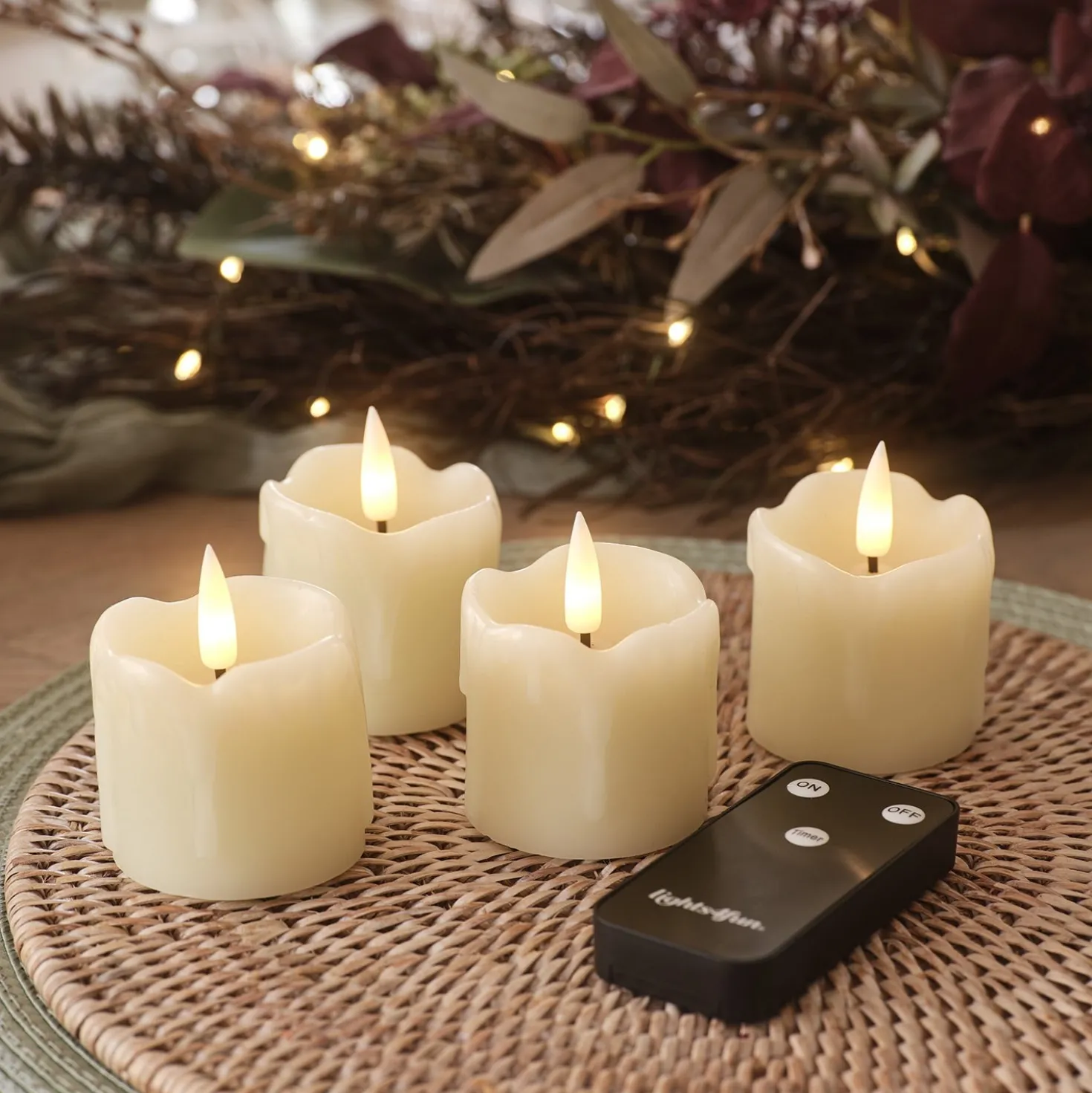 4er Set TruGlow® LED Teelichter Echtwachs mit Wachstropfen