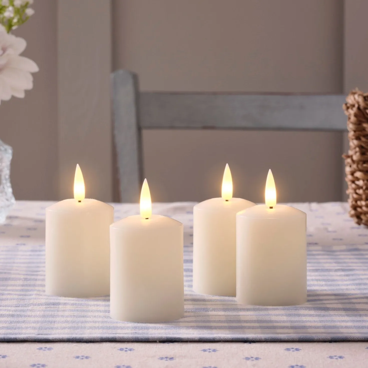 4er Set TruGlow® LED Votivkerzen Echtwachs elfenbeinfarben wiederaufladbar mit Fernbedienung
