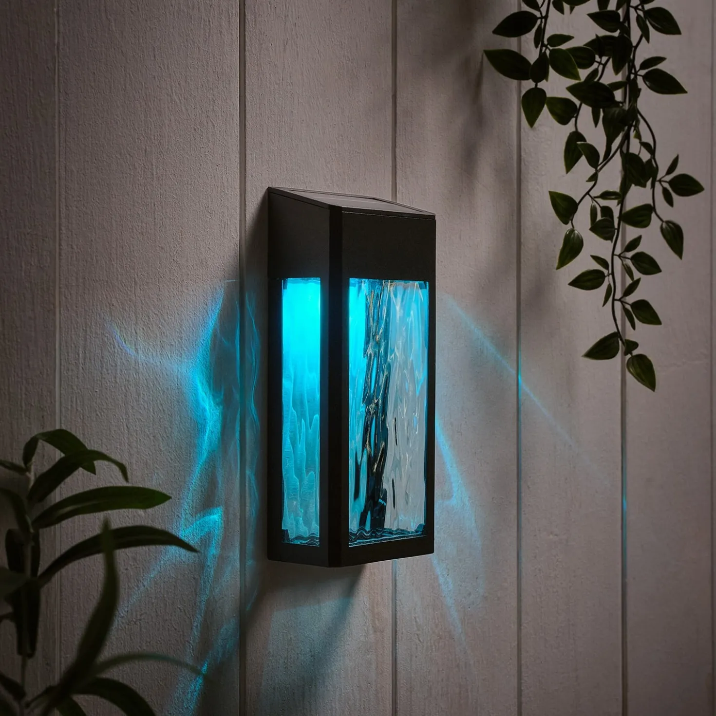 LED Solar Wandleuchte aus Glas schwarz