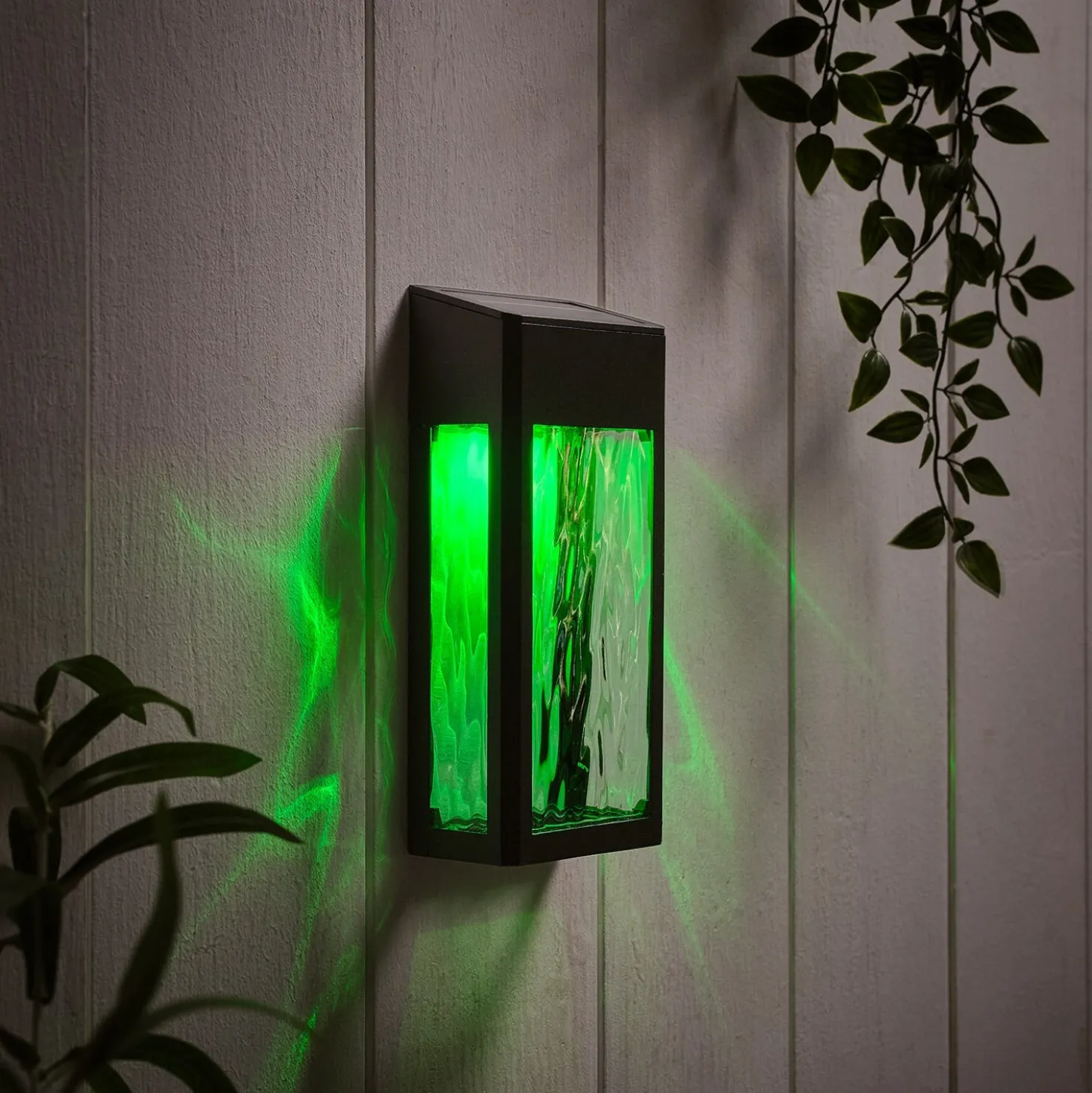 LED Solar Wandleuchte aus Glas schwarz
