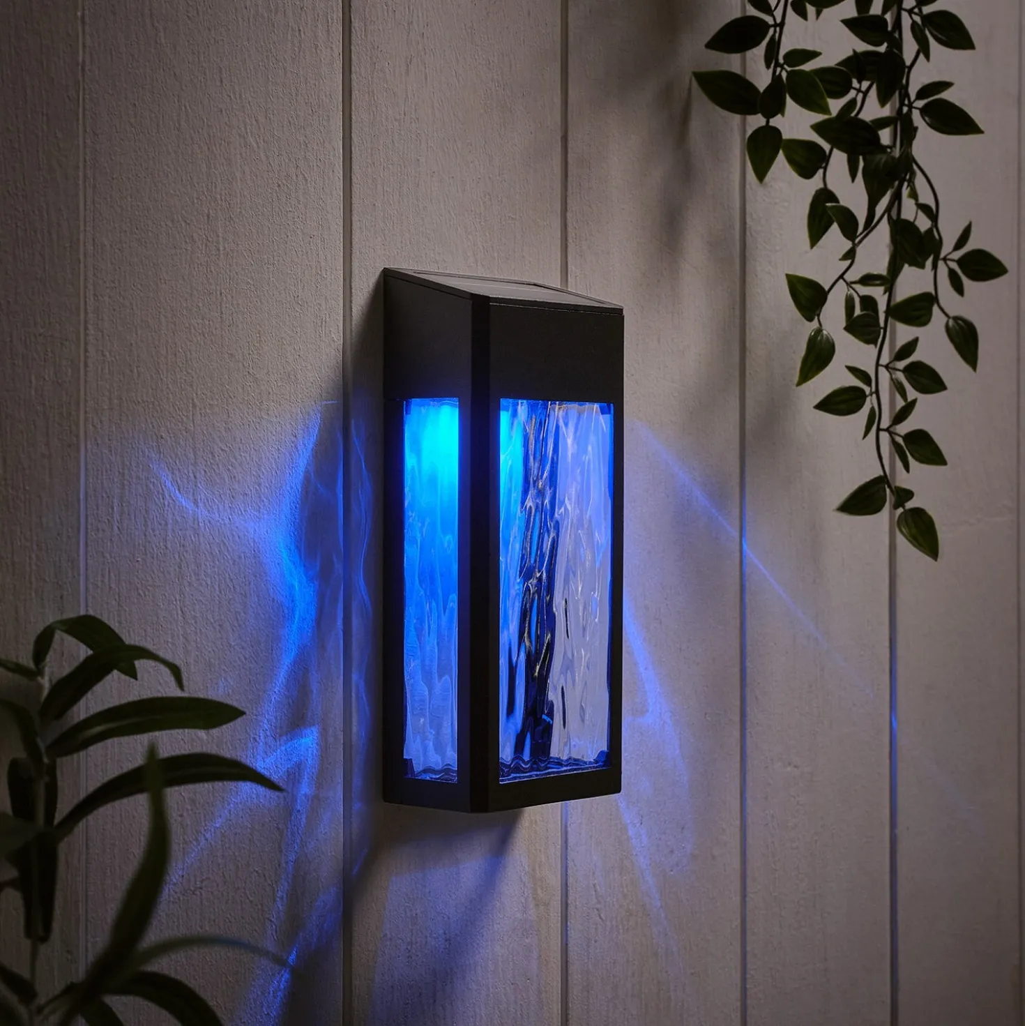 LED Solar Wandleuchte aus Glas schwarz