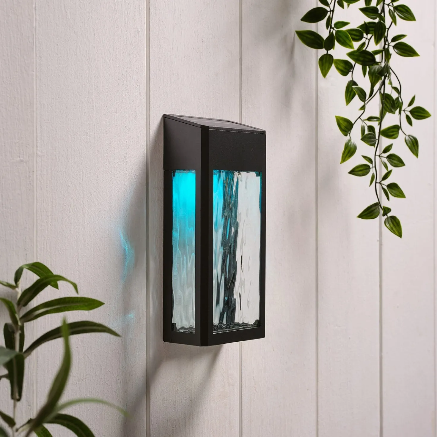 LED Solar Wandleuchte aus Glas schwarz