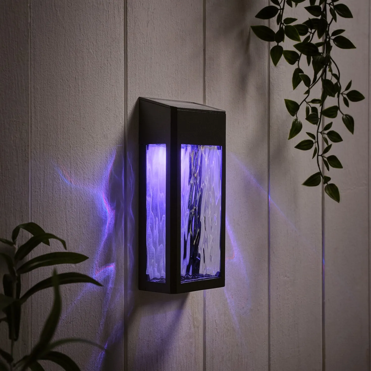 LED Solar Wandleuchte aus Glas schwarz
