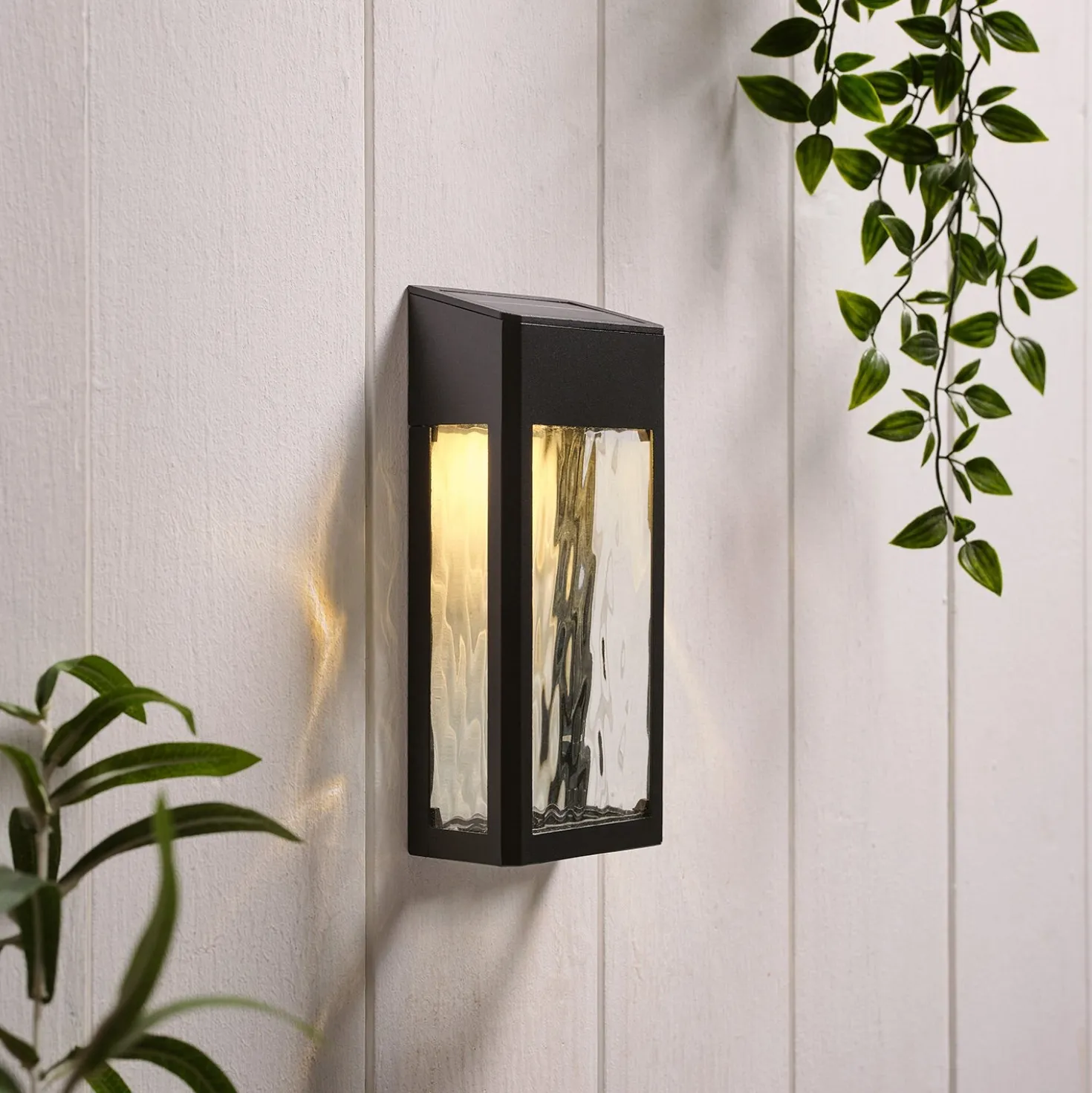 LED Solar Wandleuchte aus Glas schwarz