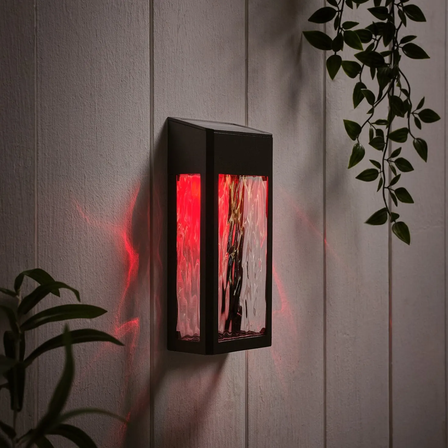 LED Solar Wandleuchte aus Glas schwarz