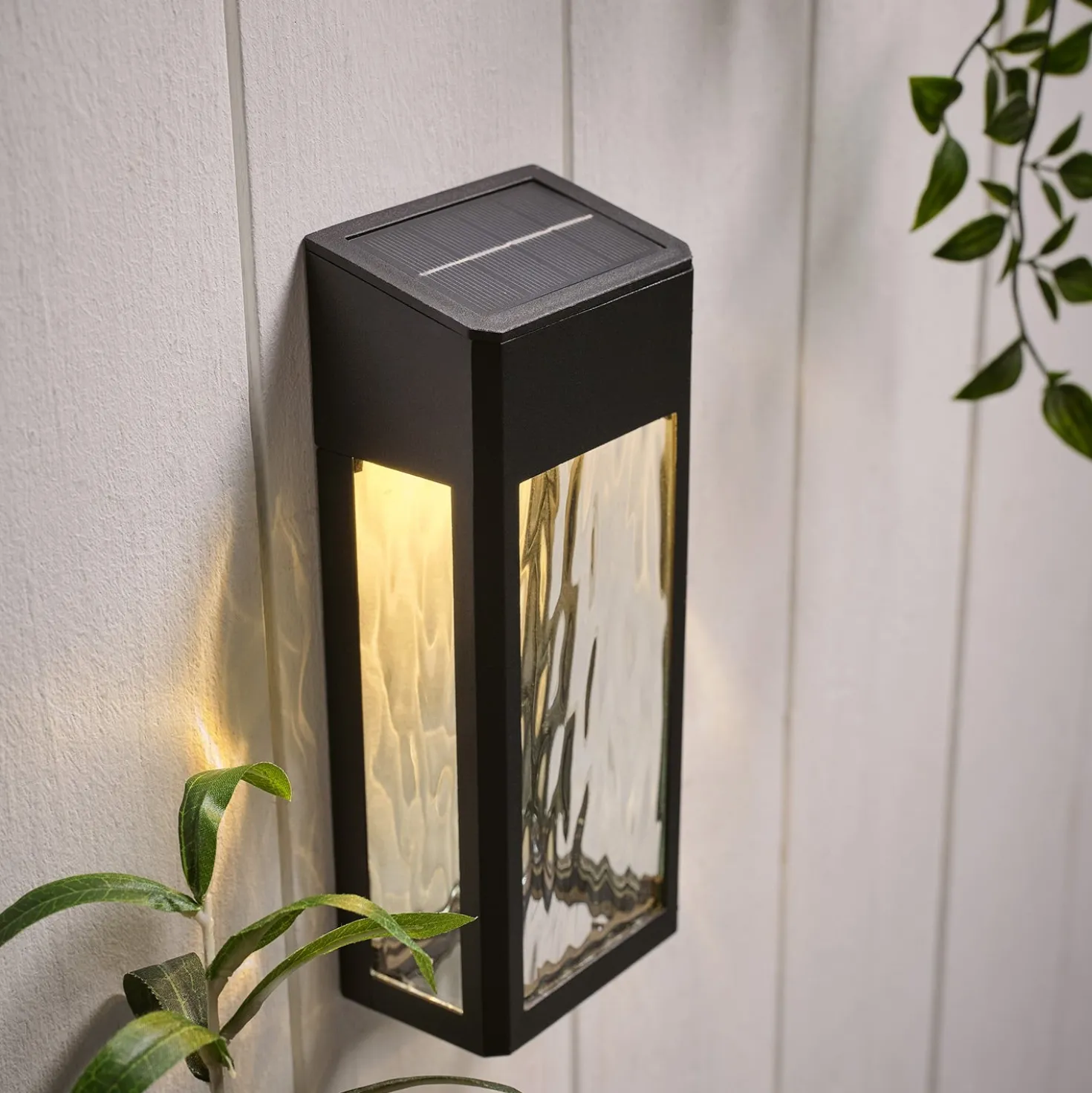 LED Solar Wandleuchte aus Glas schwarz