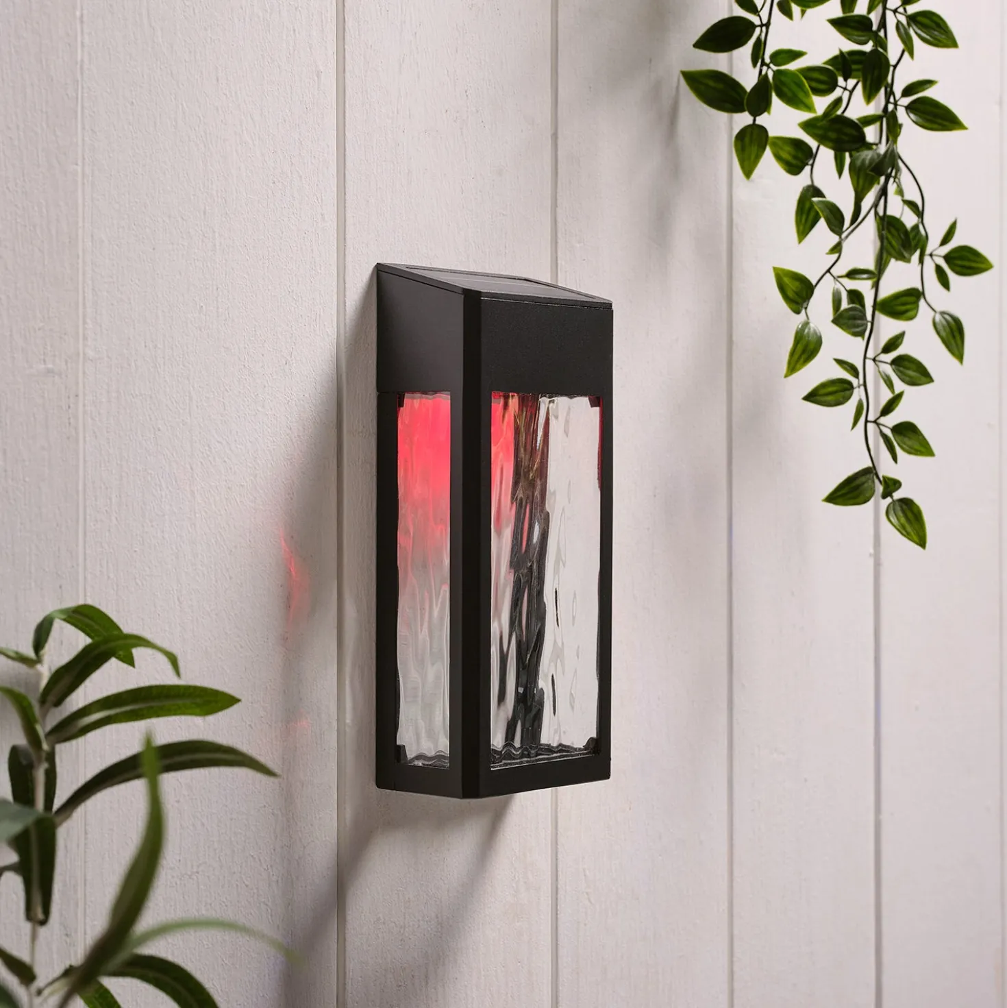 LED Solar Wandleuchte aus Glas schwarz