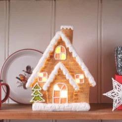 Leuchtende Häuschen & Lichterkette mit Lebkuchenmännchen