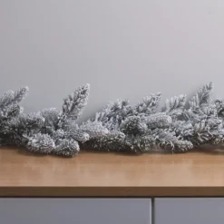 1,5m Weihnachtsgirlande mit Schnee beleuchtet