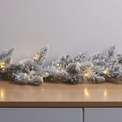 1,5m Weihnachtsgirlande mit Schnee beleuchtet