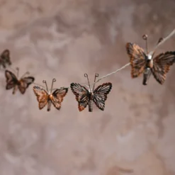 Solar-Lichterkette mit kupferfarbenen Schmetterlingen mit 10 warmweißen LEDs