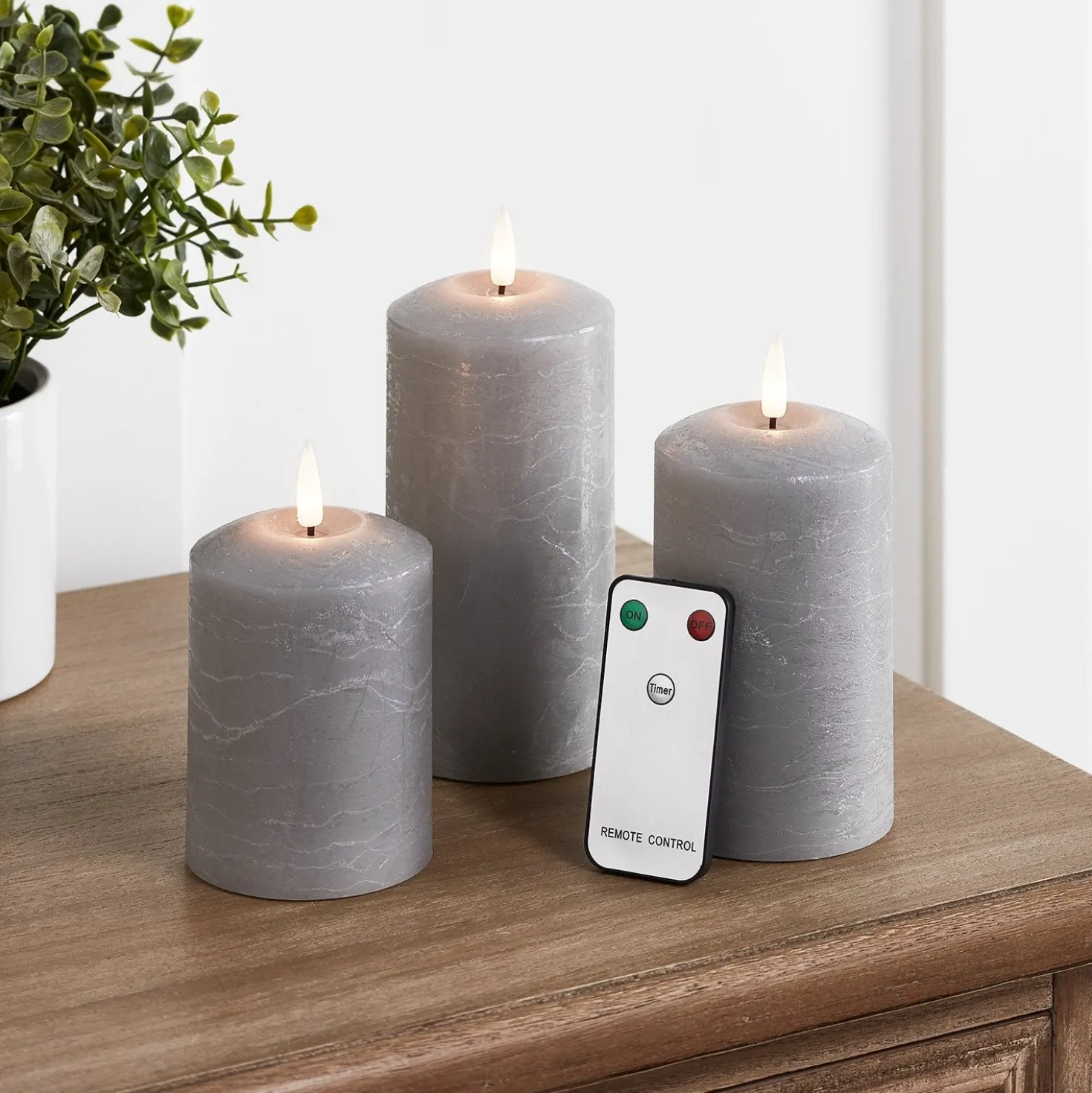 TruGlow® LED Kerzen Echtwachs Trio grau mit Fernbedienung