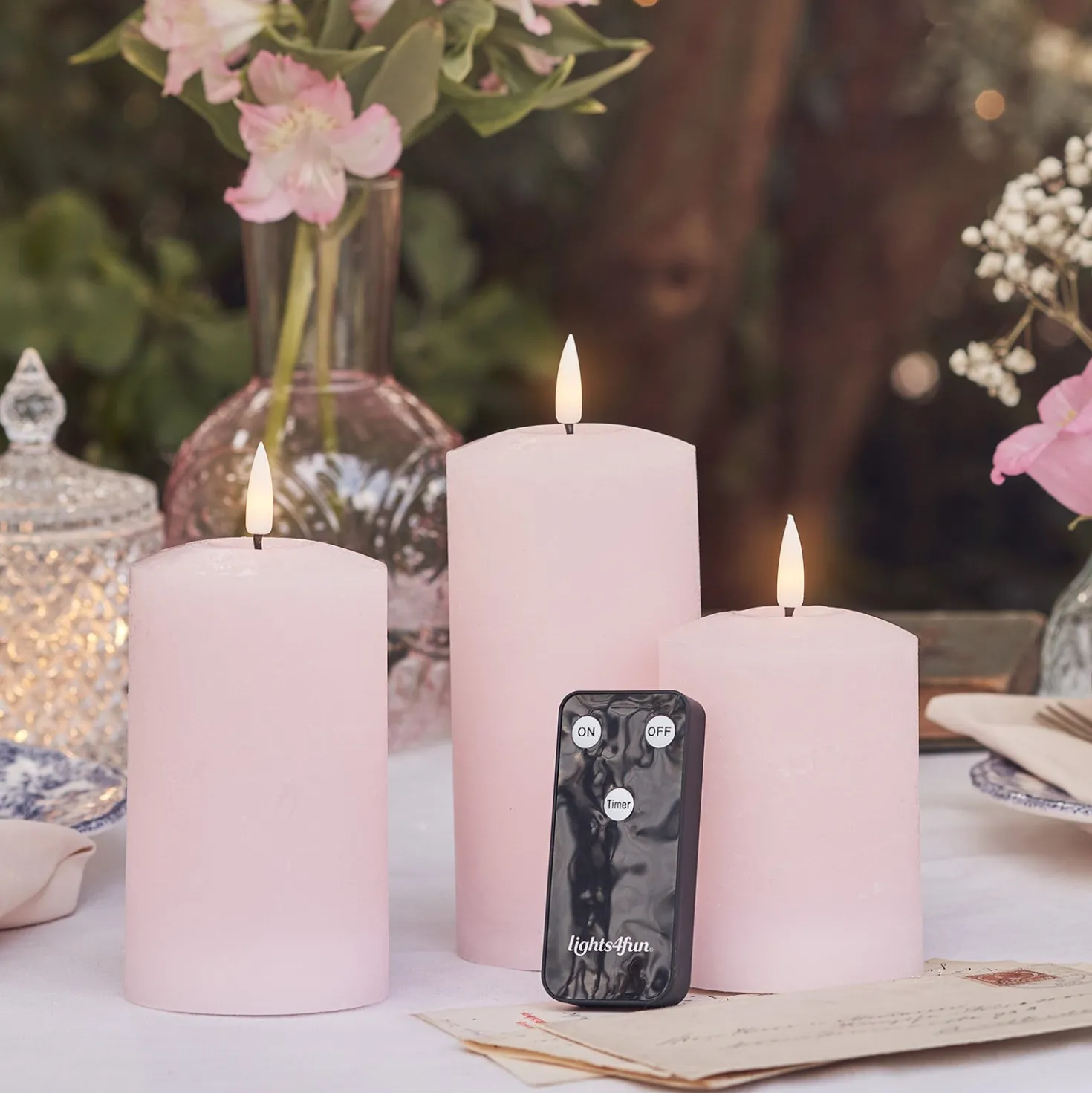 TruGlow® LED Kerzen Echtwachs Trio rosa mit Fernbedienung
