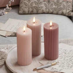 TruGlow® LED Kerzen Echtwachs Trio rosa geriffelt mit Fernbedienung