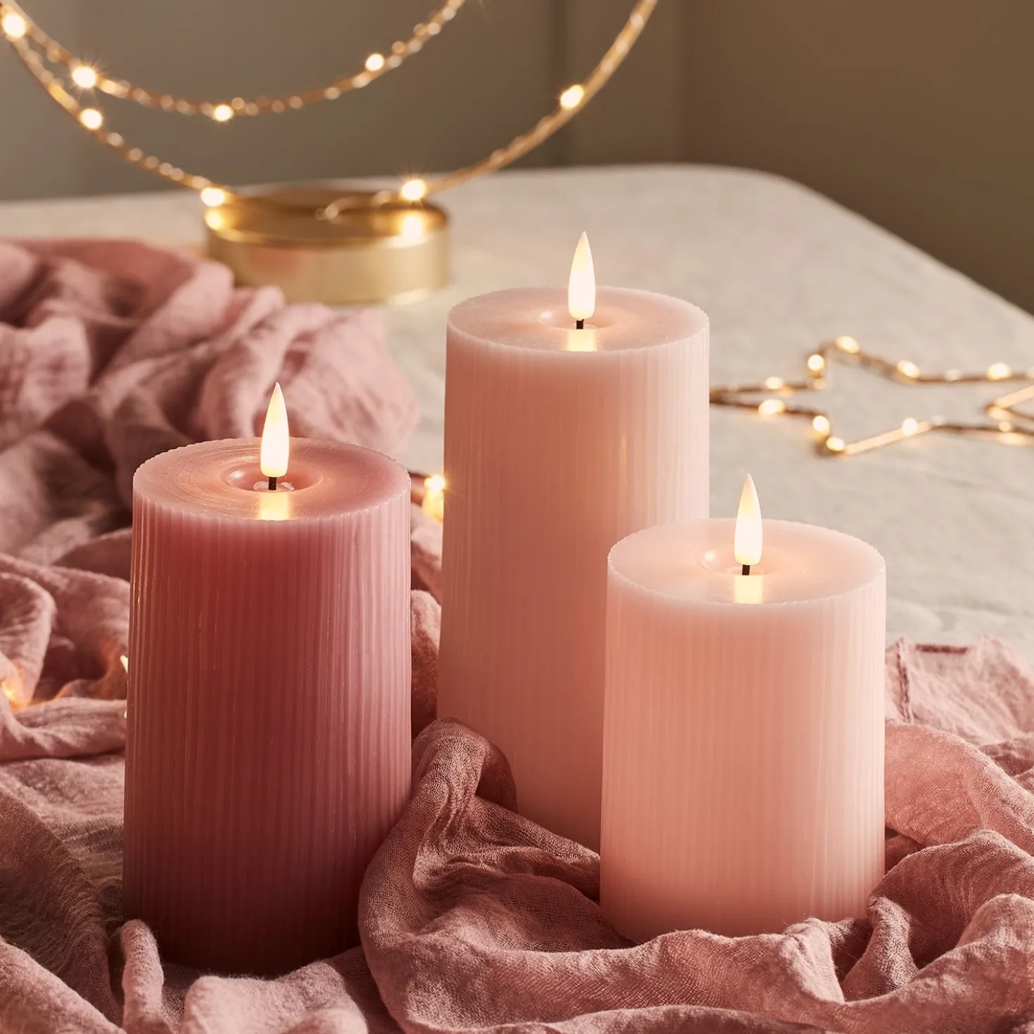 TruGlow® LED Kerzen Echtwach Trio geriffelt rosa